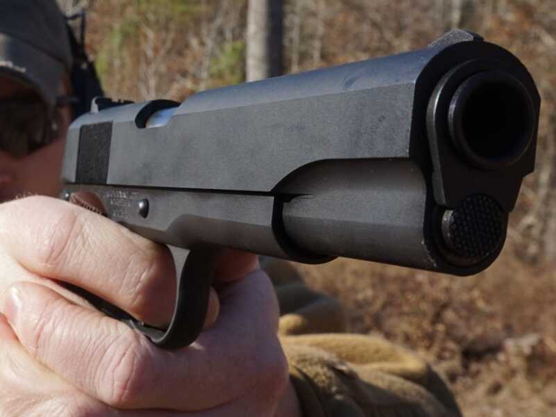 The same gun, but without the commemorative inscriptions.