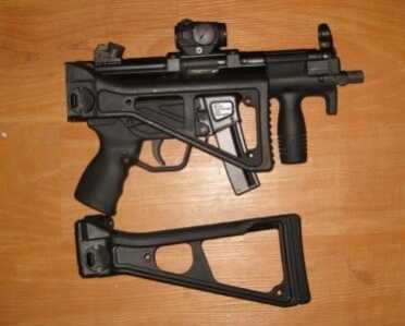 Understanding The HK MP5--Full Auto Review MP5K with side folder and fixed stock stocks are aftermarket.