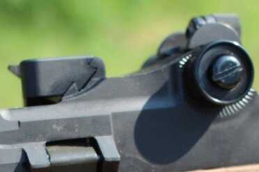 Monday Gun Day Giveaway: Springfield Armory M1A National Match This block in front of the peep sight silde out of the doevtail to allow for a scope mount to be installed.