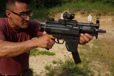 While it is possible to hold the gun out like this, it isn't easy. These are natural SBRs, but can be awkward as pistols.