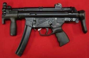 Understanding The HK MP5--Full Auto Review MP5k with collapsible stock this gun has a “clip on lower” as it is also a converted HK 94.