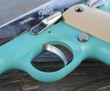 The finish on the sold trigger matches that on the rest of the pistol.