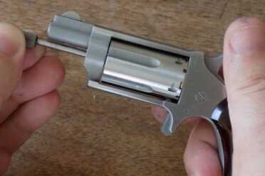 The NAA Mini Revolver: Defensive Gun or Novelty? This version's cylinder must be removed in order to load the gun.