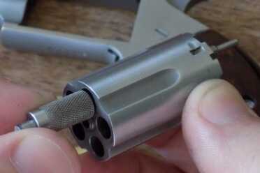 The NAA Mini Revolver: Defensive Gun or Novelty? The pin can be used to push out shells, too.