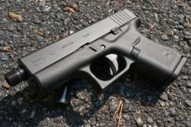 The threaded barrel may not fit in some holsters. 
