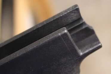 Full-Auto Fast - Product Update - Bump Stock The cut on the right side allows finger access. The shelf on the left side keeps the finger in place.