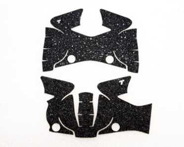 A Visit to Talon Grips No, it's not a "Rorschach" test - but the before and after of the M&P Shield grip pattern. The newly redesigned grip (bottom) is more intricate. We’re not qualified to help you if you see something else.