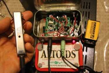 Prepping 101: Grid Down Family Communications Nationwide - Inexpensive Ham Radios for Morse Code The classic QRP radio in the Ham world is built into an Altoids tin. Out of curiosity I bought this one on Ebay because it came with a mini antenna tuner, and inside I found the "other" Pixie board on Ebay, the one that doesn't have the 5.5mm jack installed in it. This guy taped together two Altoids tins so he'd have room for the battery, and for some reason put an RCA plug for the antenna. But it works! The keyer in my hand is the Te-Ne-Ke portable iambic keyer linked above. This Pixie doesn't support the stereo cord dit/dah either.
