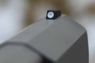 The front sight isn't adjustable. 
