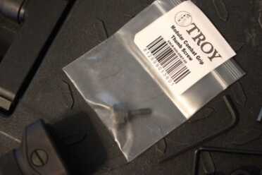 Troy Takes on the AK-47 And the screw can be replaced with a quick release version.