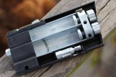 It holds the two CO2 canisters that make the gun go.
