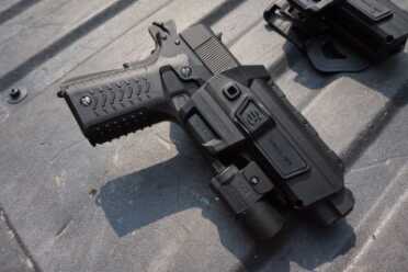 Recover 1911 Grips and Holster The holsters make carrying the Recover system as easy and reliable.