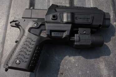 Recover 1911 Grips and Holster The HC11 holster with retention. You can use any light with this combo.