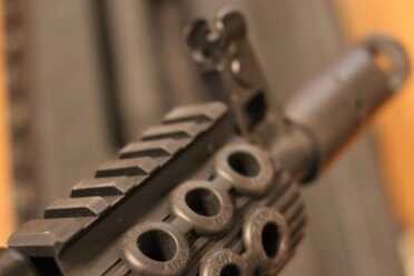Troy Takes on the AK-47 The forend tube has a small section of rail.