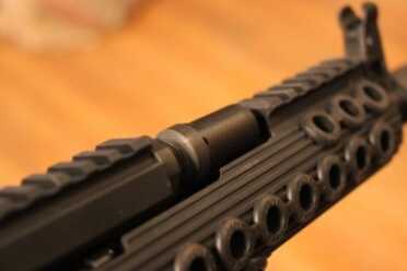 Troy Takes on the AK-47 That section is lower than the section on the gas tube.