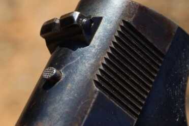 Shooting History: The Colt Woodsman The rear is also adjustable.