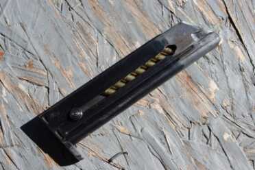 Shooting History: The Colt Woodsman First Series style magazine. Not all mags will interchange between the different series.