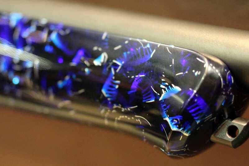 Incredible Colors for the Blaser R8 Rifles -- SHOT Show 2016 The blue is added into a mix of acrylic and aluminum shavings.