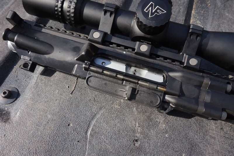 The real choice would be the optic--do you want to go for long range potential or the close range speed of a red-dot?