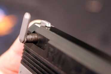 Heizer's New Semi-Auto is the Thinnest Yet--SHOT Show 2016 This pin pops out to allow for the slide to come off.