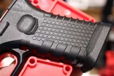 80% Glock Lower Preorders - Polymer80 - Also 80% Full AR Budget Kit – Shot Show 2016 Detail on the grip.
