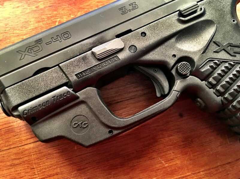 We Shoot the New .40 S&W XD-S from Springfield Armory I installed this Crimson Trace Laserguard for testing. It worked like a champ and the green laser was clearly visible in daylight conditions at my outdoor range.