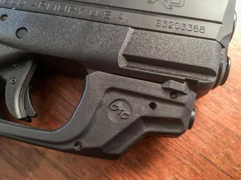 New Crimson Trace Laserguard Springfield XD-S - Review - SHOT Show 2016 The Laserguard installs under the ridges of the Picatinny rail.