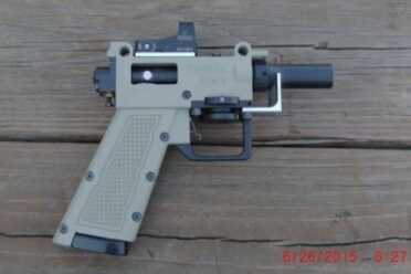 The pogojet, a less-lethal weapon that can neutralize targets at long distances.  Would ever consider letting it replace your every day carry sidearm?  (Photo: Daily Mail)