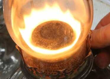 Prepping 101: High Output Rayo Center Draft Lamps With Diesel Fuel This lamp was slightly larger, but you can lay the chimney in it and the flame is still correct.