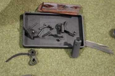 Buying Guide: When a Gun Needs a Little Work Internal parts being inspected.