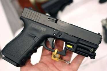 Trigger Activated Lights and Lasers? Trigger Point Technology--SHOT Show 2016 The GLOCK laser on a 19.
