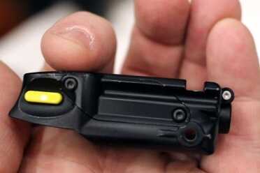 Trigger Activated Lights and Lasers? Trigger Point Technology--SHOT Show 2016 The laser device is actually very compact.