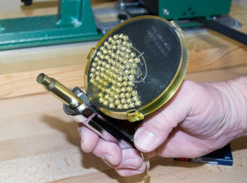 With This simple hand tool you can re-prime hundreds of cases per hour. I've never timed myself, but it's fast.