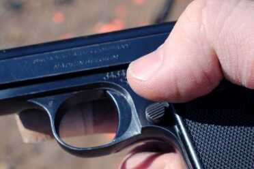The Baby Browning--a Micro Classic This is not a mag-release button. It is the safety in the "fire" position.