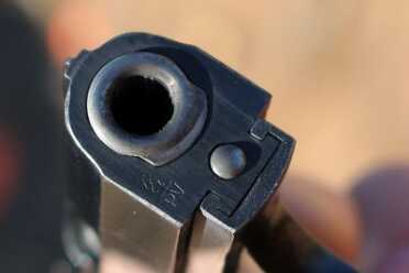 The Baby Browning--a Micro Classic The muzzle end shows how the barrel locks up with the slide.
