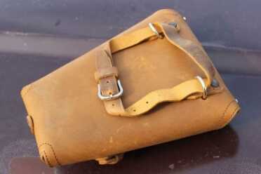 Saddleback Leather Pistol Wrap--Review Strap it down, around, up... lots of options. No belt loops, though.