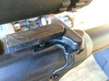 Other than being made of polymer, the charging handle looks and operates like the centerfire version.