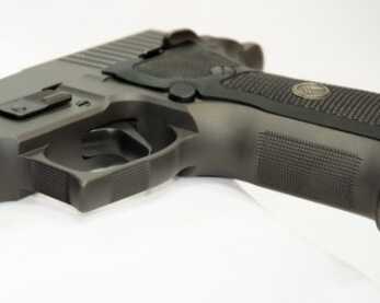 The Search for the Holy Grail Ends Here: SIG Sauer Legion P226 SAO The superb checkering has been expanded to include support hand grip under the trigger guard.