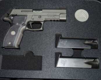 The Search for the Holy Grail Ends Here: SIG Sauer Legion P226 SAO The case is custom fit to each model and has a place for the coin and available knife.