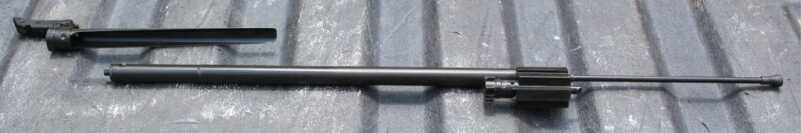 The operating rod contains the recoil spring--the thin plunger sticking out the back end.