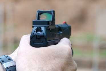 Note that with the red dot installed on the Q5 Match, the rear sight is removed. 
