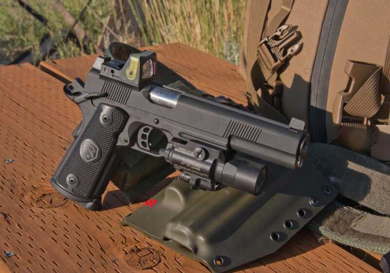 A 100-Yard 1911: Republic Forge Longslide 10mm—Full Test The 10mm longslide is shown here fitted out with a Surefire X400 unit on the dustcover accessory rail.