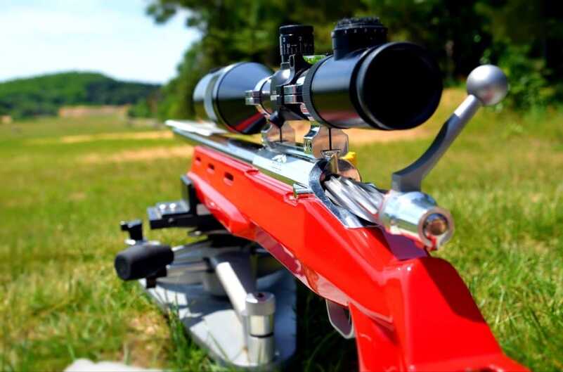 F-Class rifle, in candy apple red, with a nice rest, and gorgeous machining on the bolt...a hot rod of long range shooting!