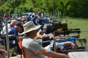 When you're not shooting, you have to take a turn scoring. This means watching through your spotting scope to look at the target, verify it was pulled and score, and write down the correct score. Being a good scorekeeper is important in Highpower. Poor ones are not well liked.