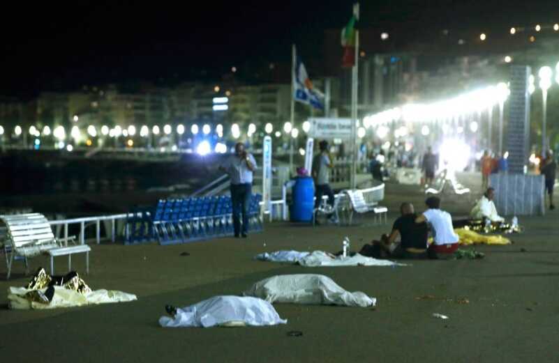 Bastille Day Celebration Turns to Massacre in Devastating Truck Attack ATTENTION EDITORS - VISUAL COVERAGE OF SCENES OF INJURY OR DEATH - Bodies are seen on the ground July 15, 2016 after at least 30 people were killed in Nice, France, when a truck ran into a crowd celebrating the Bastille Day national holiday, July 14, 2016. REUTERS/Eric Gaillard TEMPLATE OUT.