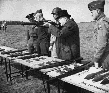 MilSurp: Collecting The Model 1903A4 Sniper Rifle Prime Minister Winston Churchill was always interested in small arms. He is shown here with General Eisenhower inspecting and shooting a selection of infantry weapons, including the new Model 1903A4. Note the ammunition clips on the table. U.S. Army Signal Corps photo.