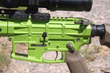 The Grunt utilizes titanium parts as well as extensive lightening cuts to achieve its feathery weight. Note the open-cut mag well.