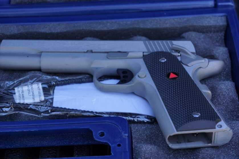 Colt Delta Elite 10mm showing contrasting matte and polished stainless steel surfaces
