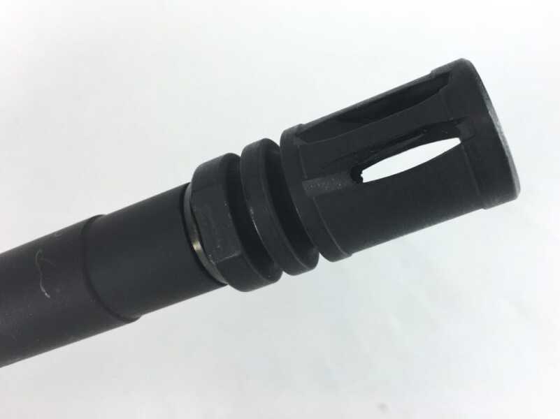 A 6-pound, sub-MOA, 9 5.56mm AR?—Full Review. The rifles comes with a standard birdcage flash hider timed with a compression washer. If you want to change muzzle devices, the thread pattern is standard 1/2x28.