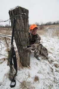 Check cameras and rehang them in areas where you plan to hunt to determine when exactly to sit your stand. Courtesy Bill Winke.
